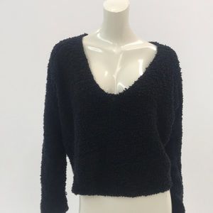 Slight cropped black v neck free people sweater